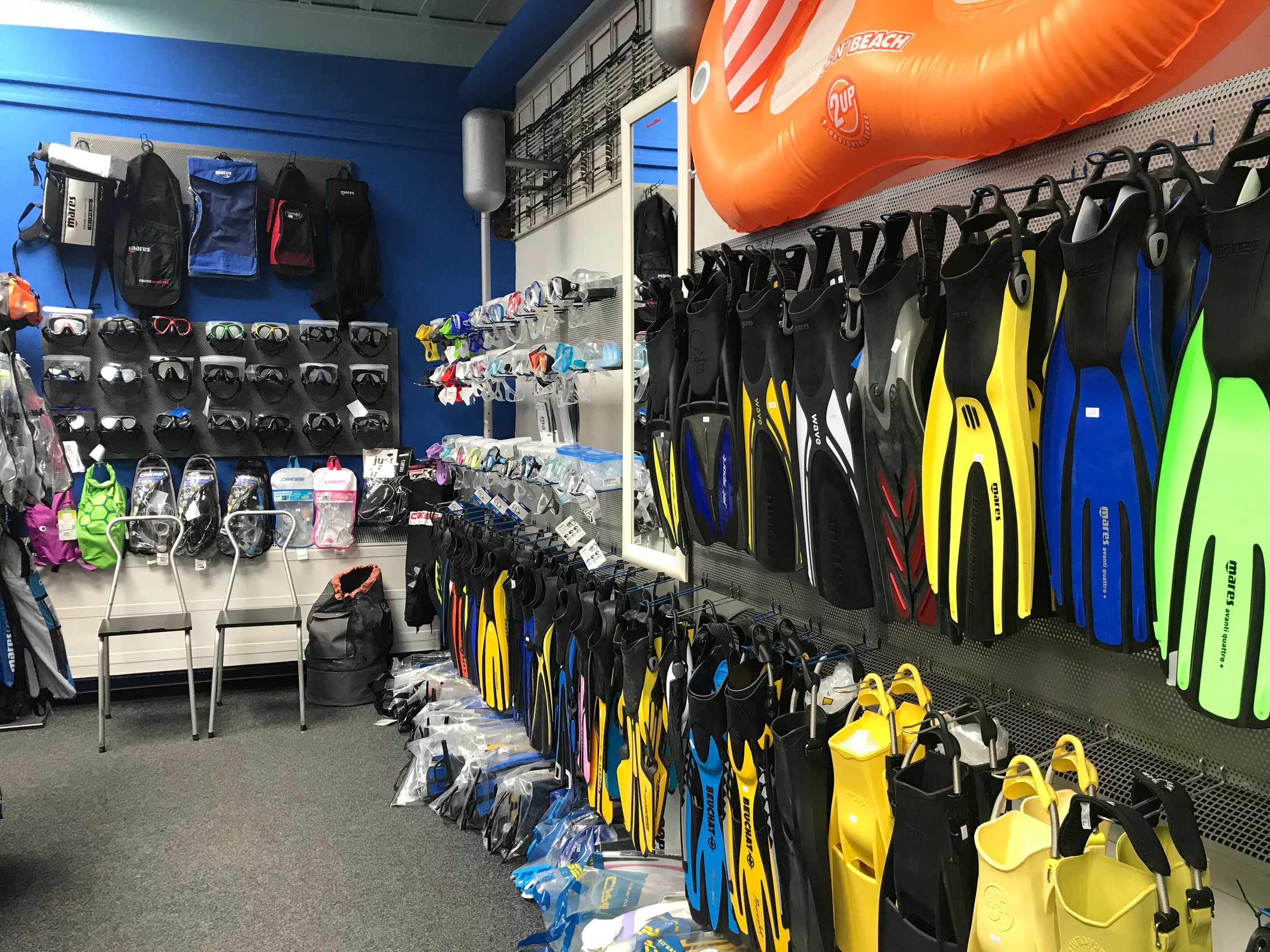 Colourful equipment and the Divers Direct shop interior