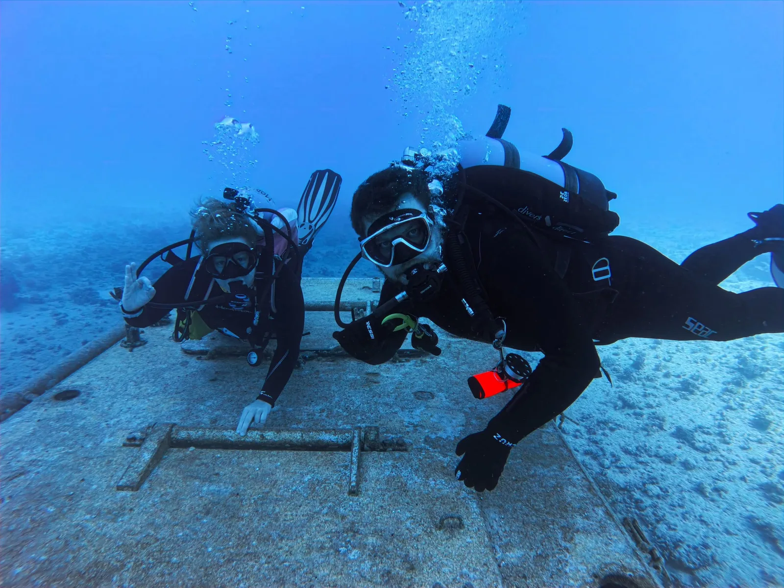 Divers beneath the surface